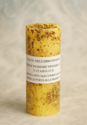 Vela rituale gialla con scritta dark abyss, simbolo di stabilità e ricchezza.